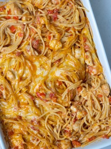 baked chicken spaghetti made in a baking tray in the oven