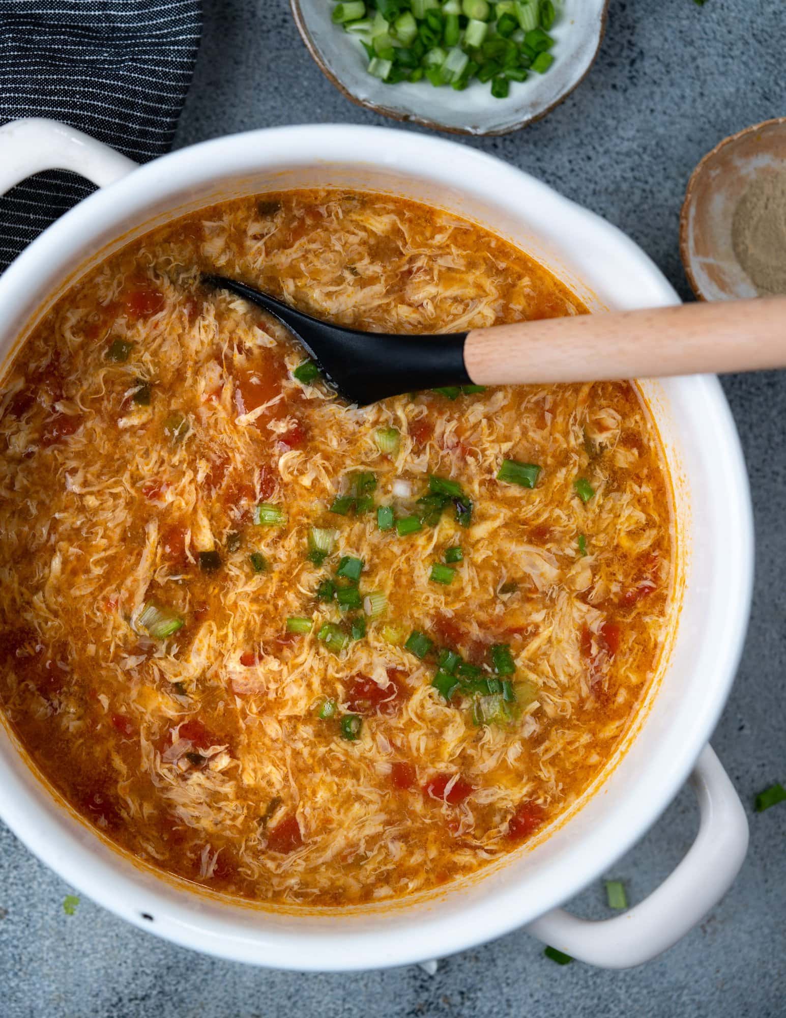 Tomato Egg drop soup is a variation of the classic Chinese Egg drop soup. Tangy tomatoes give an interesting twist to this quick 15 minutes soup, made with a handful of pantry staples.