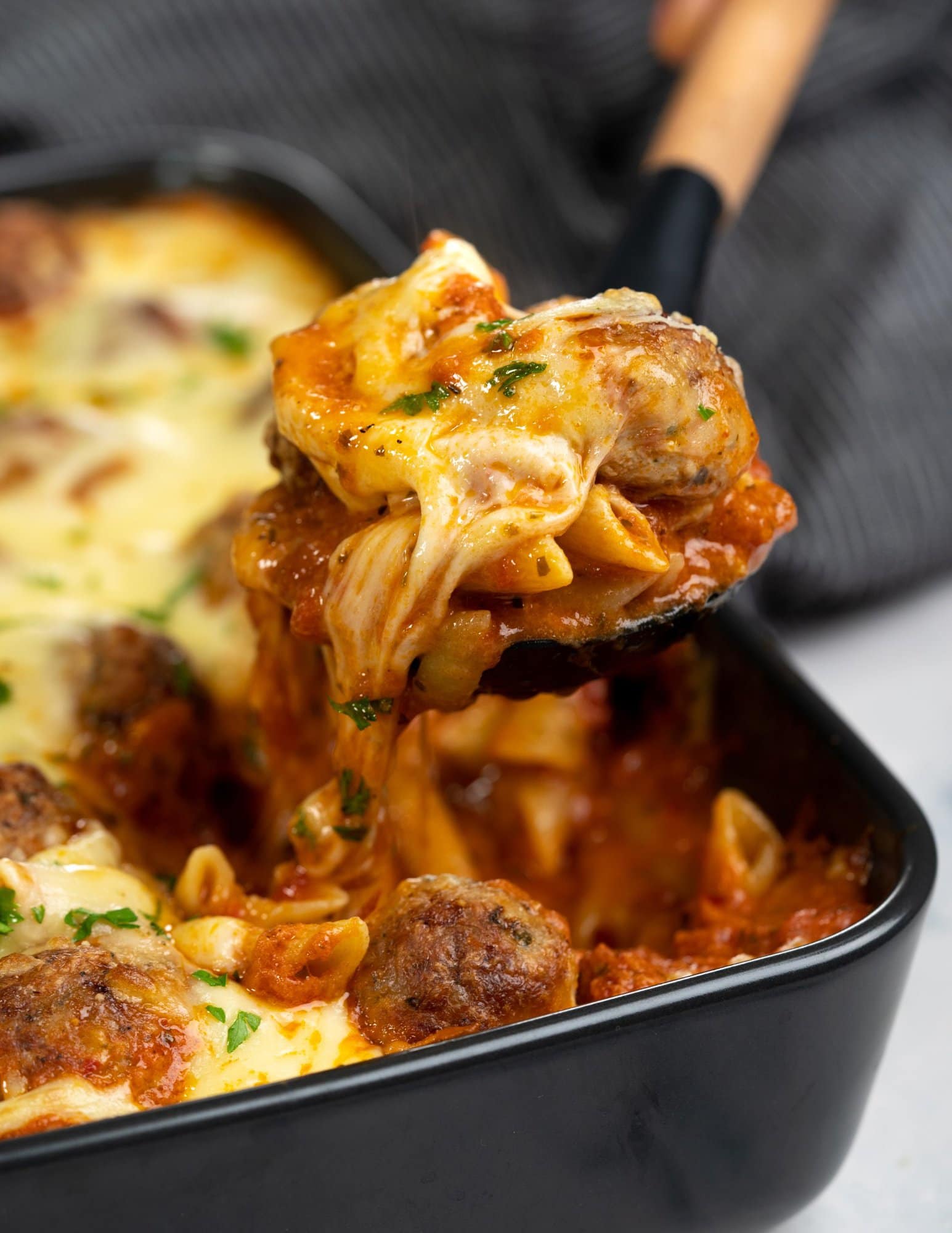 Cross sectional view of  a Cheesy Meatball casserole 