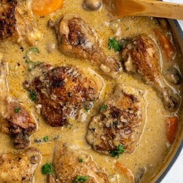 Bone-in chicken pieces lyng in a delicious, creamy sauce packed with flavors from mushroom and stock.