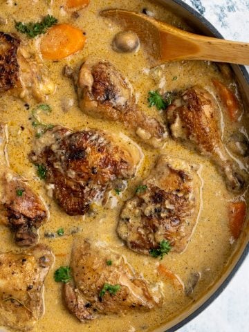 Bone-in chicken pieces lyng in a delicious, creamy sauce packed with flavors from mushroom and stock.