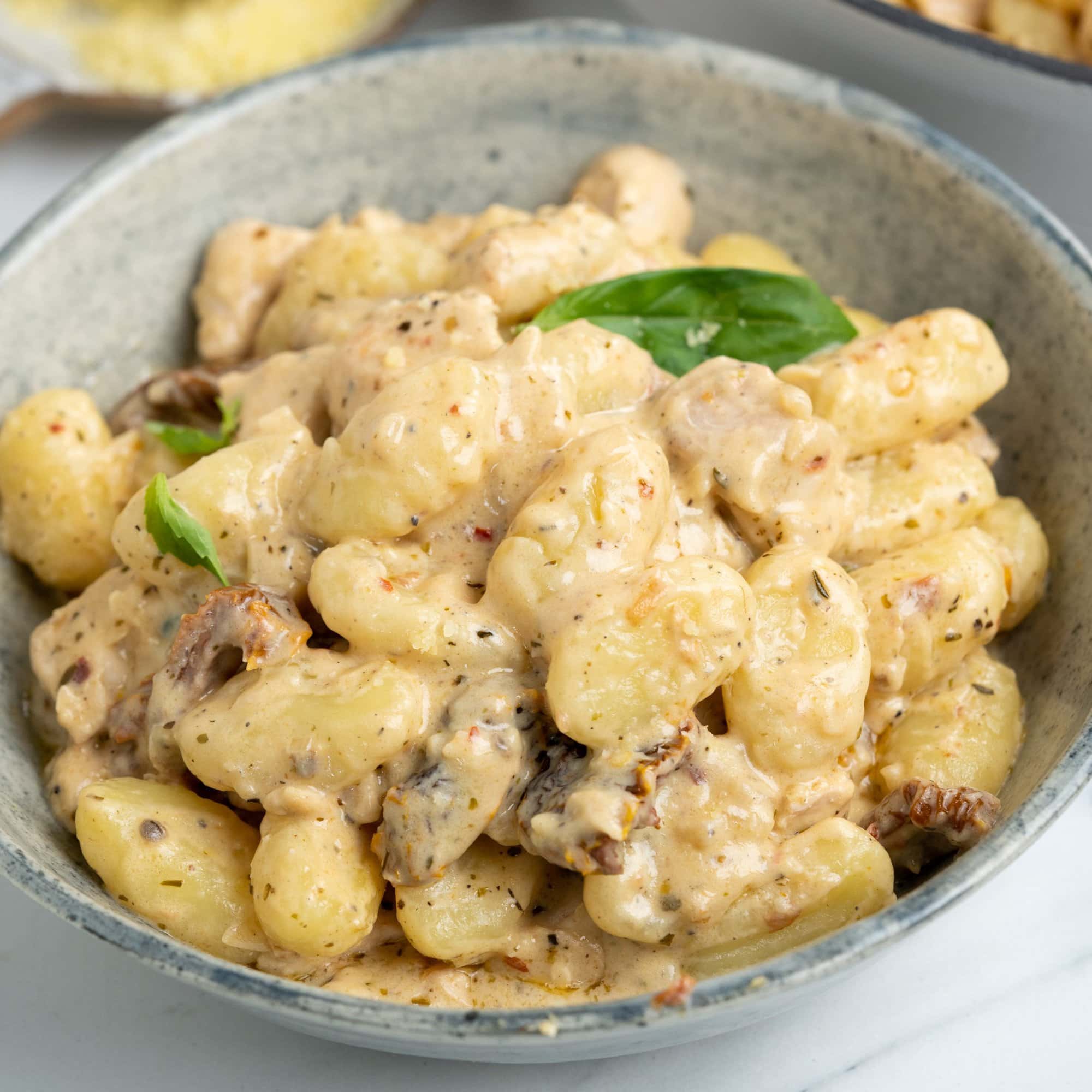 chicken breast, gnocchi in a creamy parmesan sauce with sundried tomatoes, Italian basil.