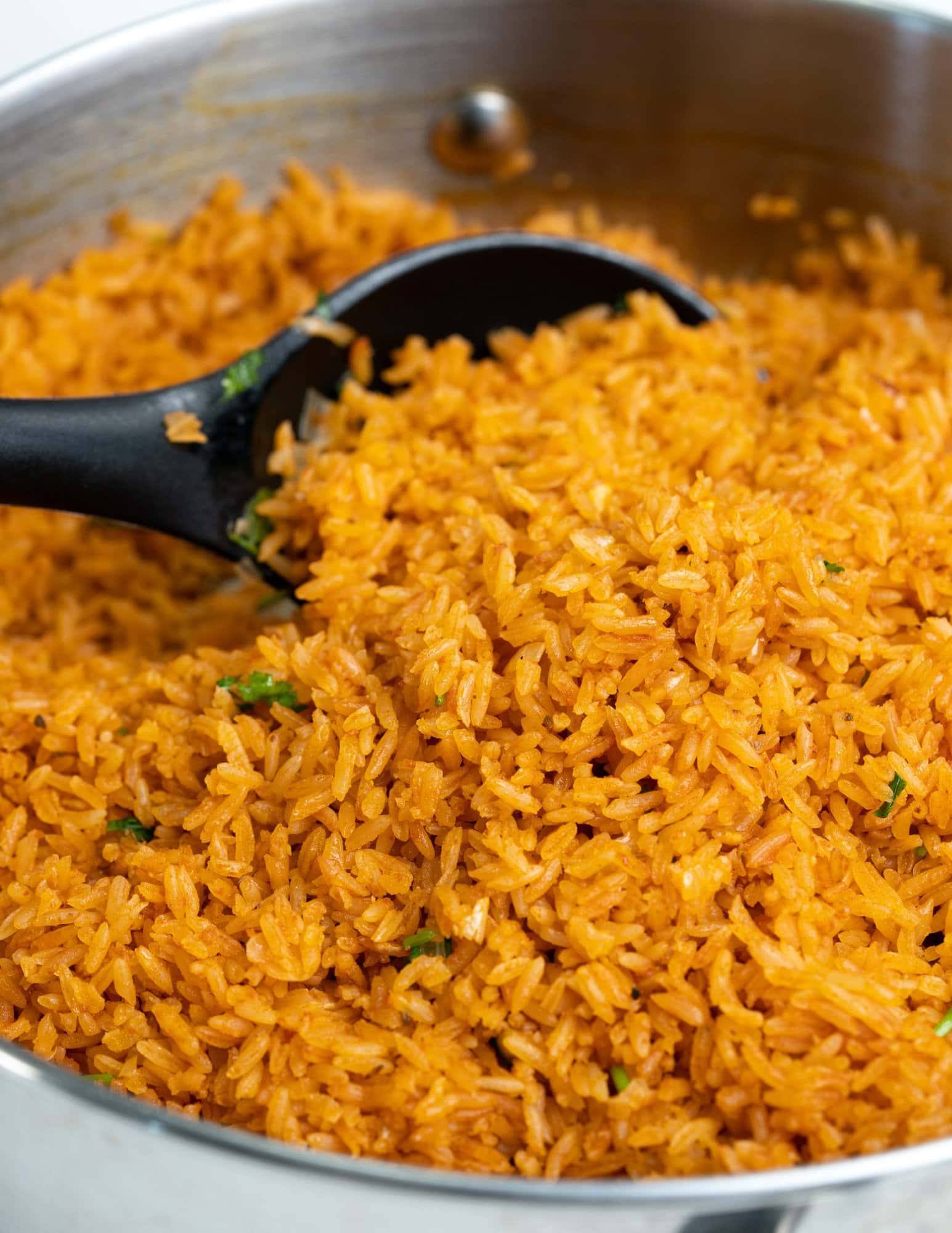 Easy to make Mexican rice flavoured with tomato, onion, garlic, cumin, paprika and oregano. 