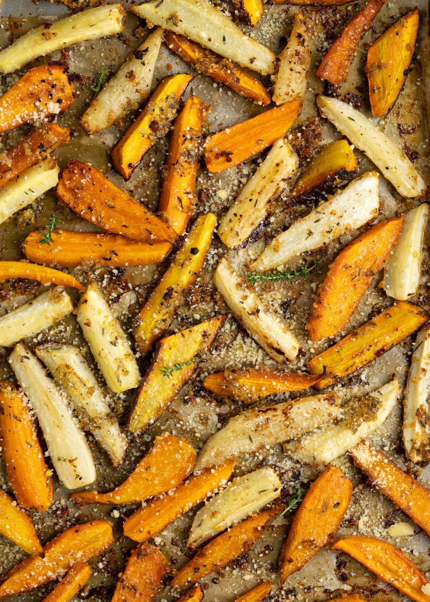 Garlic parmesan Carrots roasted in oven until caramalized around the edges 