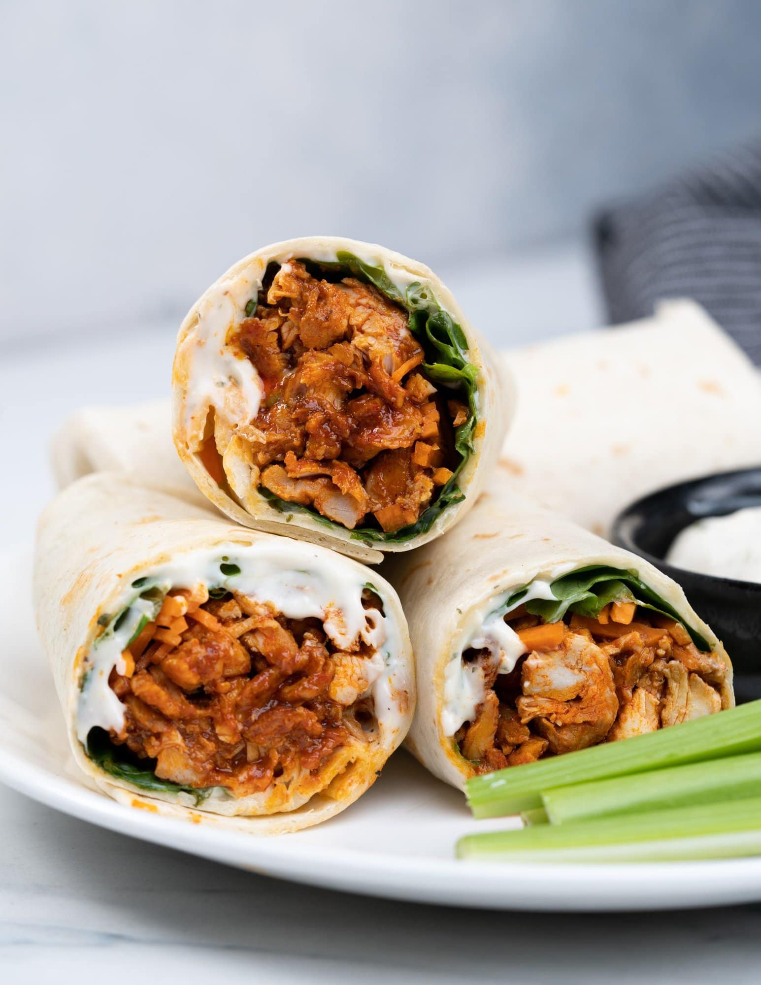 Tortilla wraps filled with juicy buffalo chicken, carrots, salad greens and then topped with creamy ranch dressing.