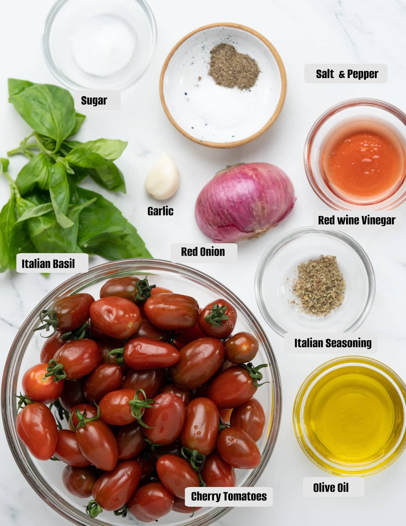 Ingredients for cherry tomato salad : cherry tomatoes,olive oil,Italian Seasoning,Italian basil,red onion,garlic,red wine vinegar,sugar,salt& pepper