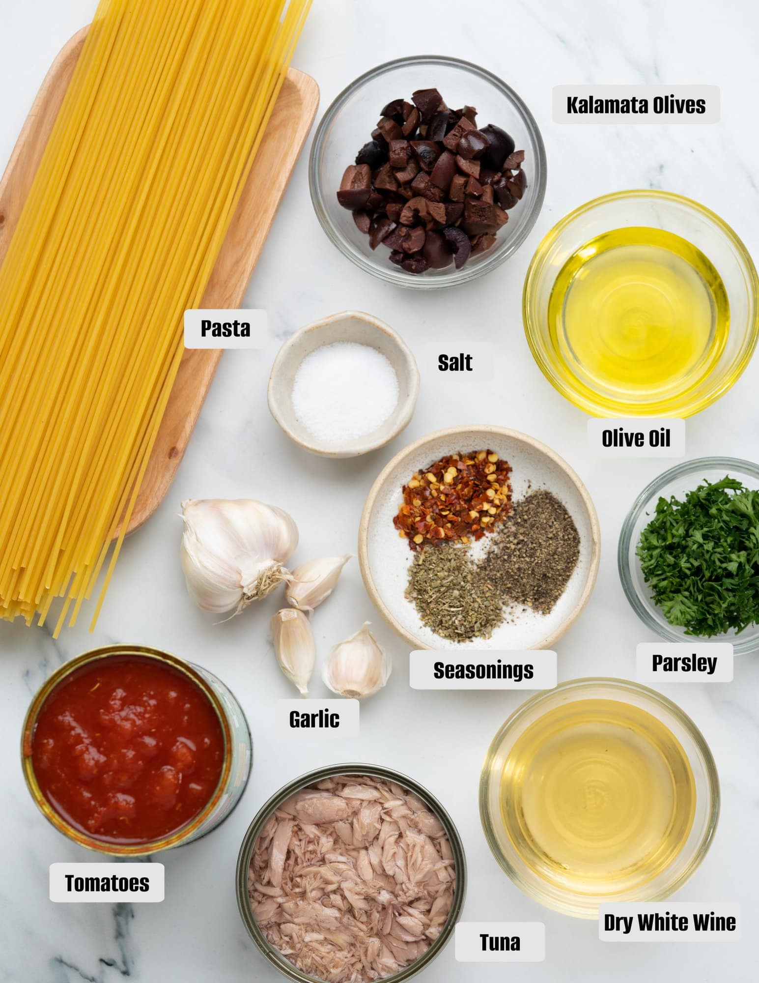 Ingredients - Spaghetti, Tuna, Tomatoes, Kalamata olives, olive oil, white wine, parsley, garlic and seasonings.