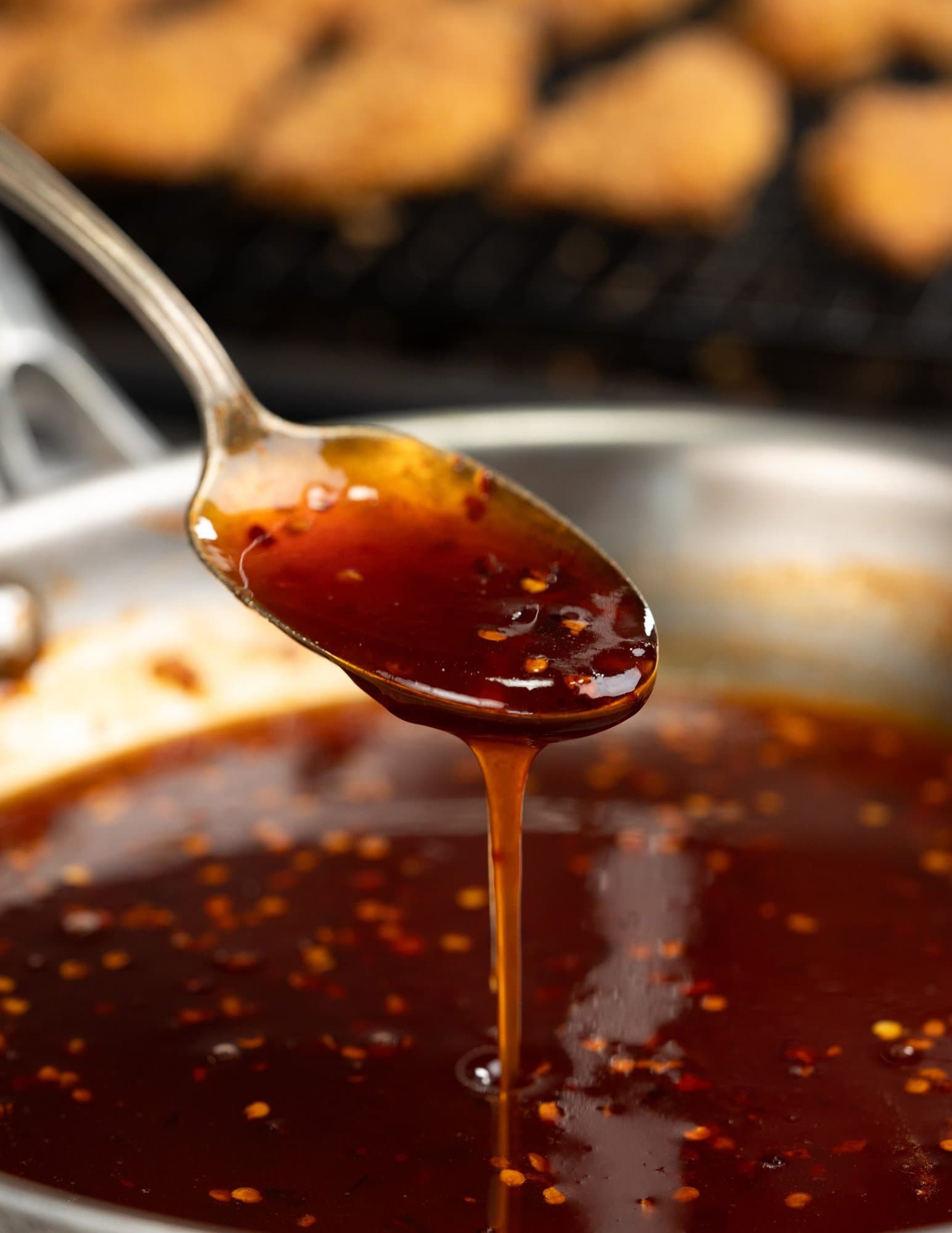 hot honey sauce made with honey, sriracha, chilli flakes and salt. 
