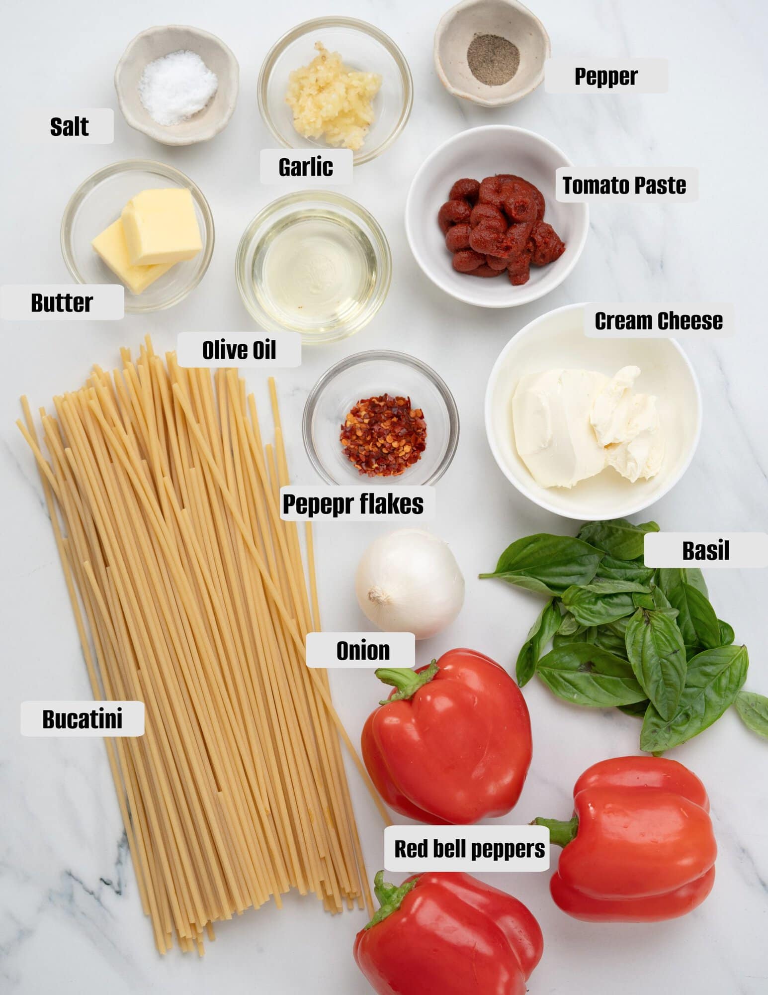Ingredients image: pasta, red bell peppers, herbs, aromatics, butter, olive oil and cream cheese.