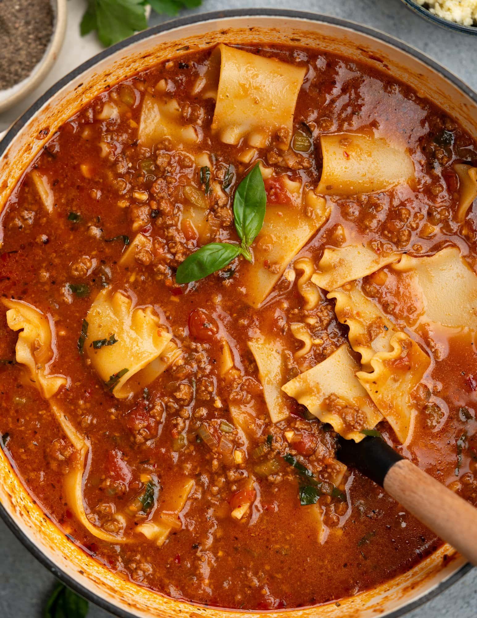 One pot Lasagna Soup in a large soup pot with beef, tomato base and lasagna noodles. 