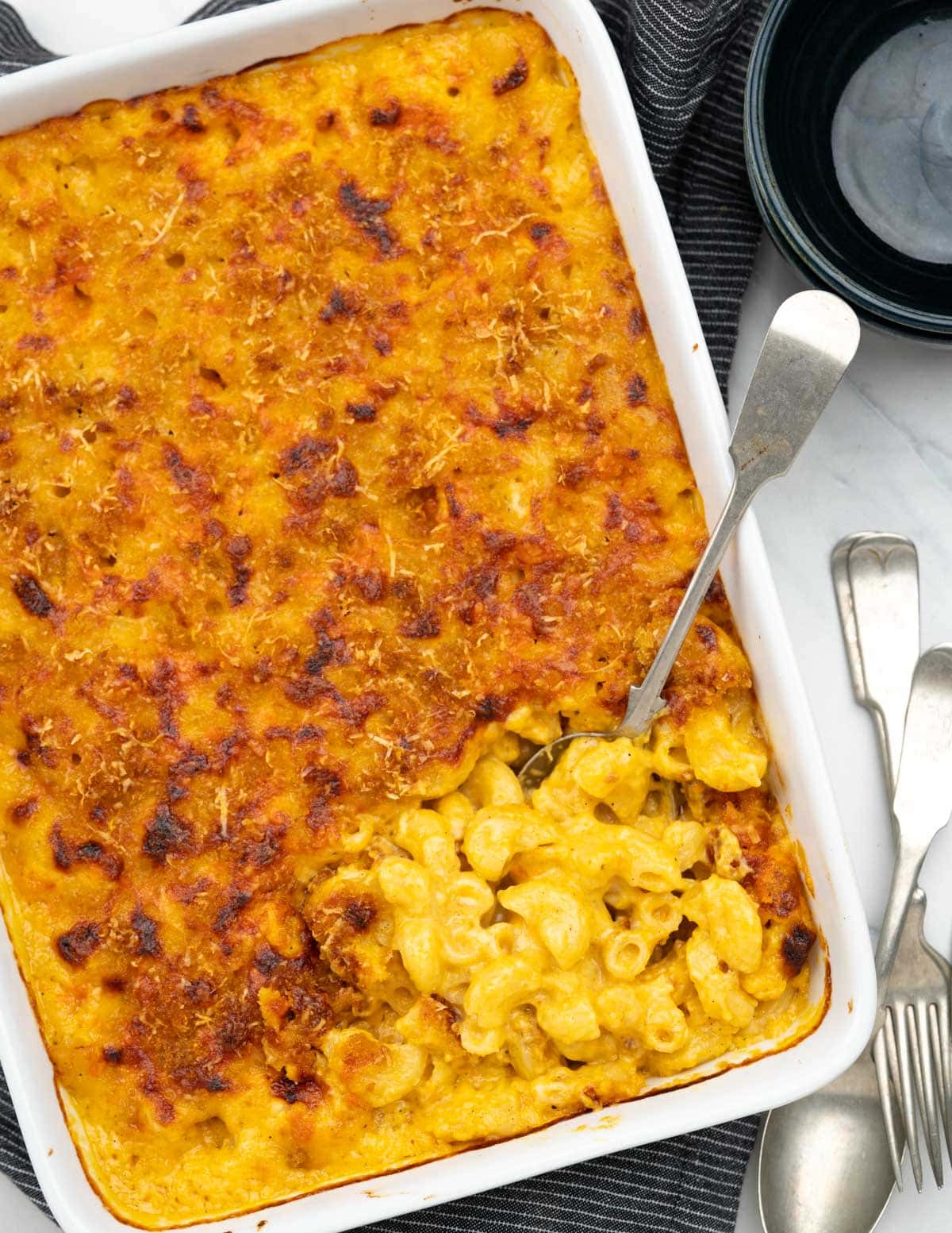 Top view of Cheesy Baked Mac and Cheese topped with breadcrumb topping, in a casserole dish