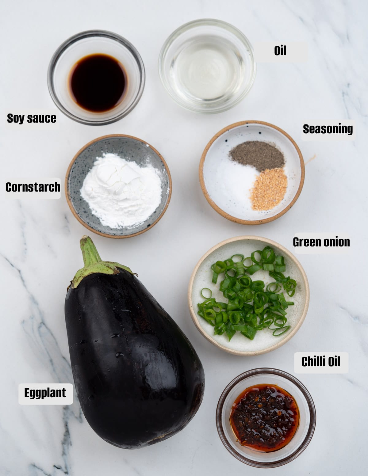 Ingredients - Eggplant, Cornstarch, garlic powder, salt, pepper, oil, saoy sauce, Chilli Oil crisp