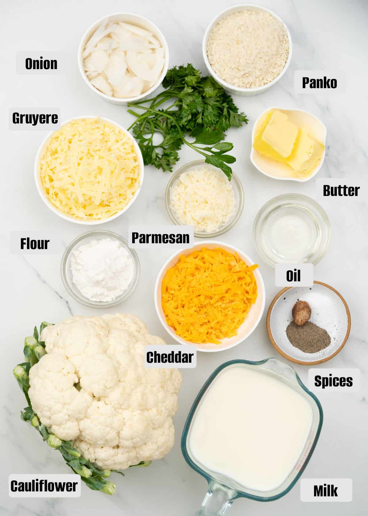 Ingredients to make a rich and indulgent Cauliflower au gratin.