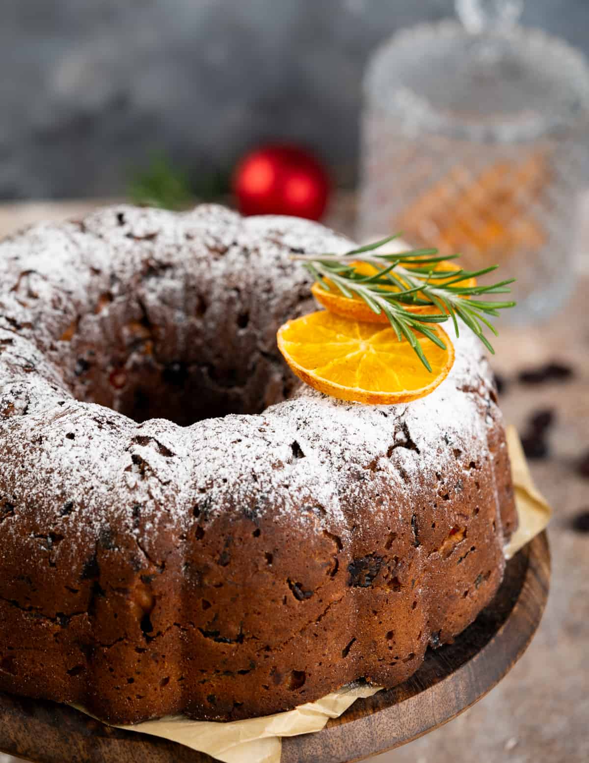 Classic Fruit cake is loaded with dried fruits(lots of them), nuts, and warm spices. This holiday cake has a beautifully dense moist crumb. Perfect for gifting or as a centerpiece on the holiday table.  