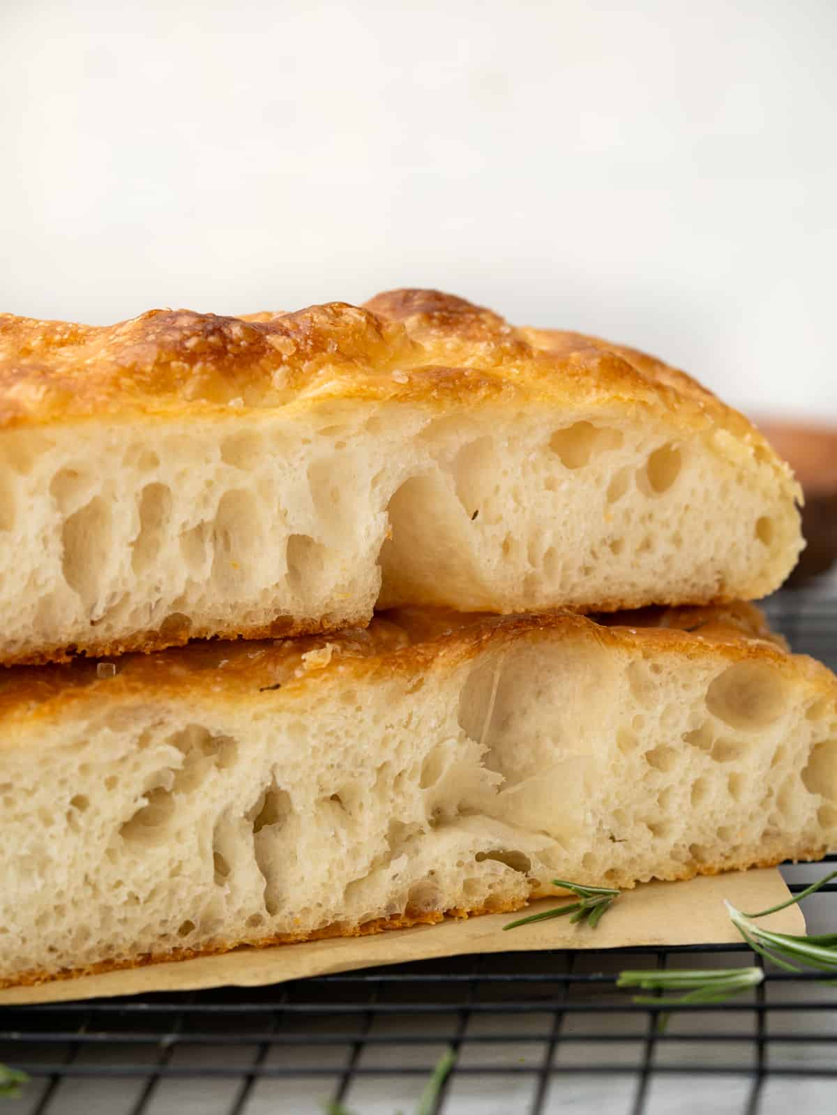 Close up of Focaccia bread cross section with big bubbles.