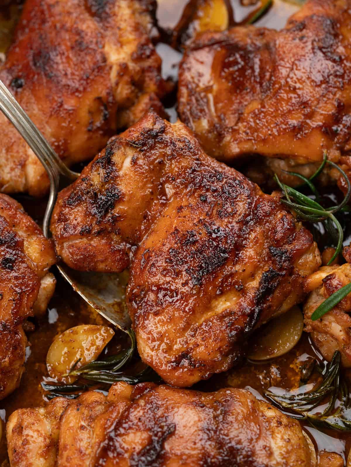 Crispy chicken thighs with glazed with sweet and spicy sauce. 