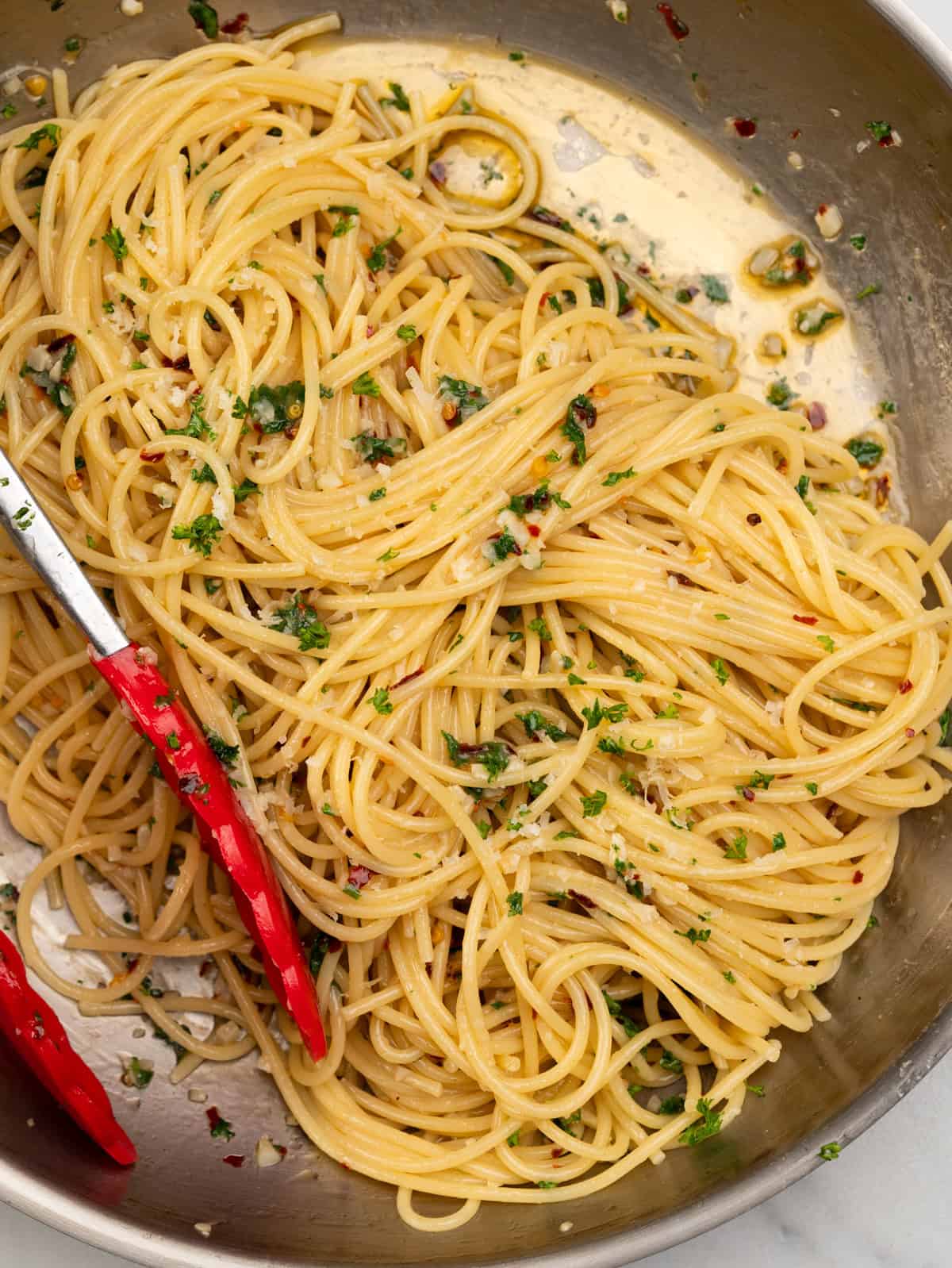 spaghetti in Garlic infused olive oil , chillis, parsley and parmesan - a perfect aglio e olio