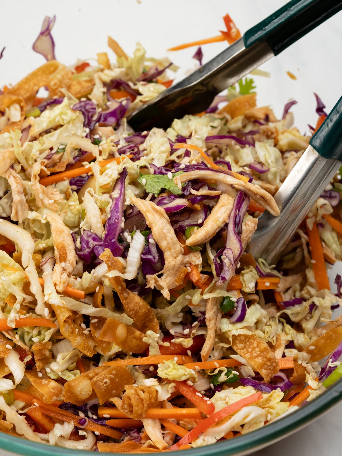 shredded chicken, cabbage, carrots, peppers all tossed in an Asian Sesame Dressing. 