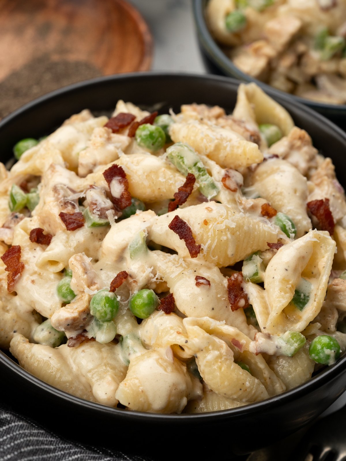 Shell pasta with diced grilled chicken, crispy bacon, peas, bell peppers, onion tossed in a mayo dressing. 