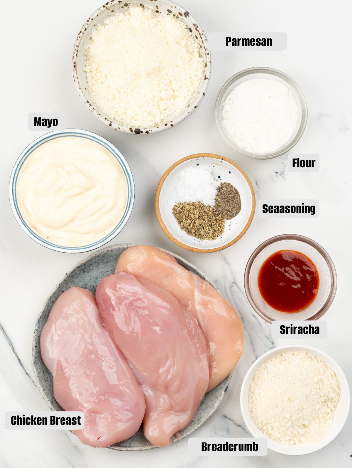 Ingredients for Parmesan Crusted Chicken - Chicken breast, mayo, parmesan, breadcrumb, seasoning. 