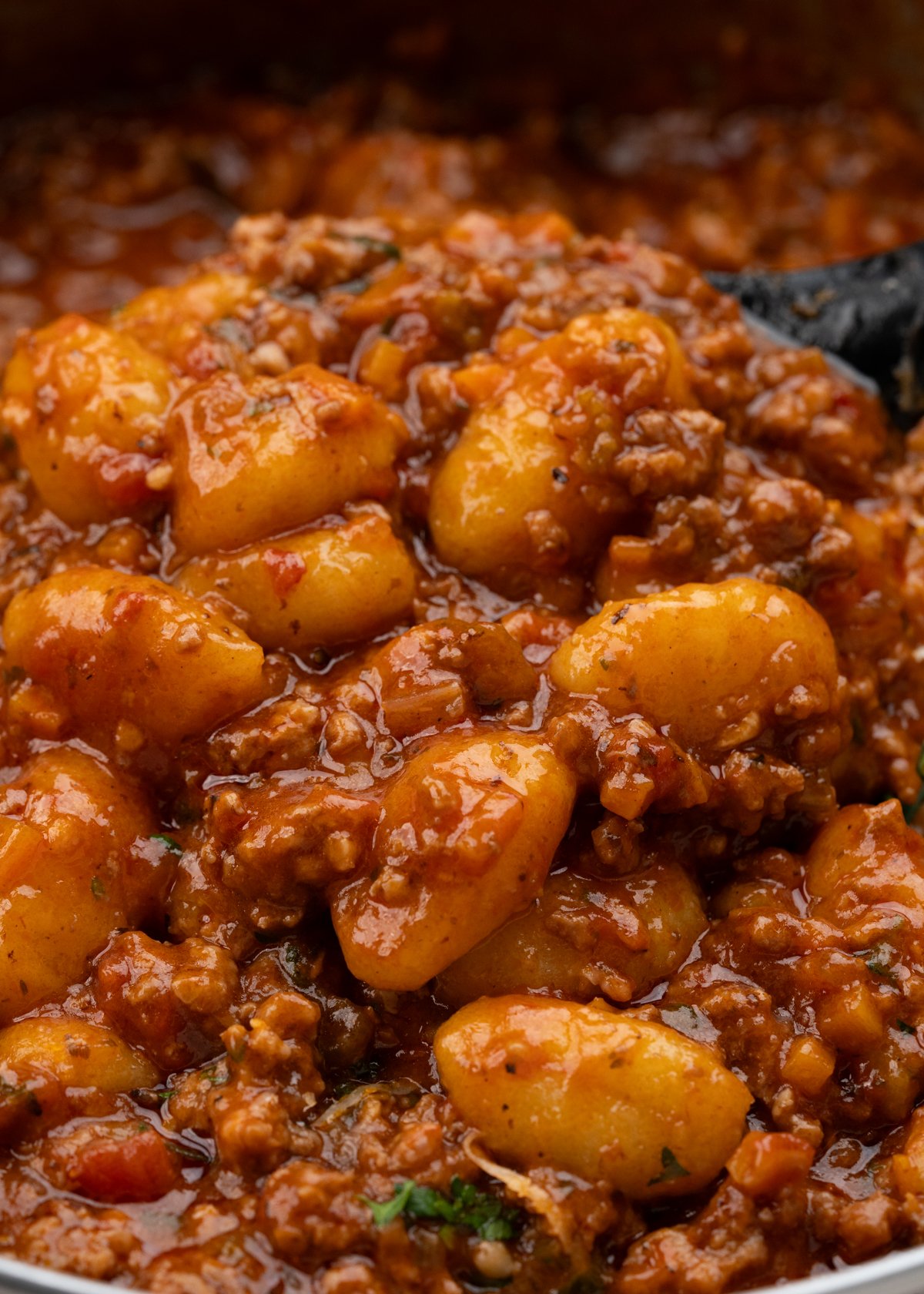 Soft pillowy gnocchi nestling in thick meaty Bolognese sauce.