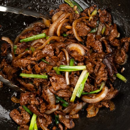 Thin slices of flank steak stir fried in a savory Asian inspired sauce.