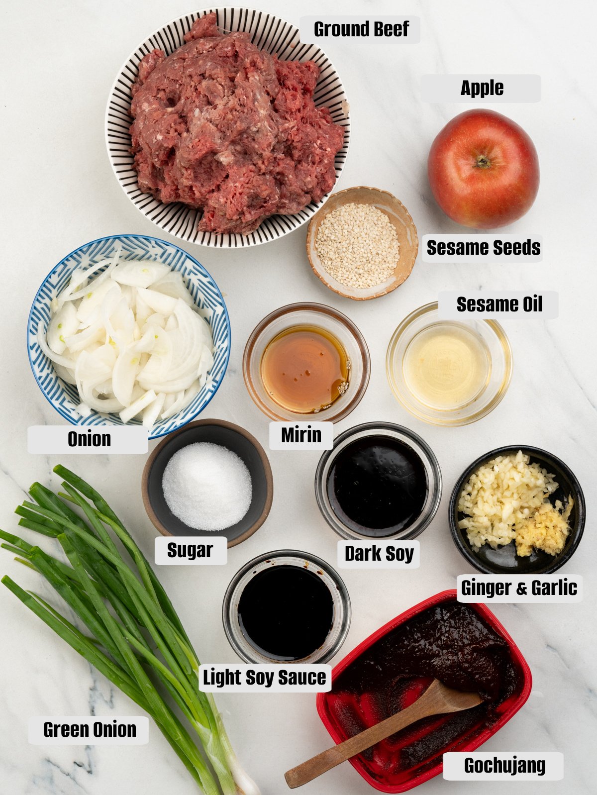 Ingredients - Ground beef, grated apple, light soy, dark soy, mirin, gochujang paste, onion, ginger, garlic, sesame seeds and sesame oil.