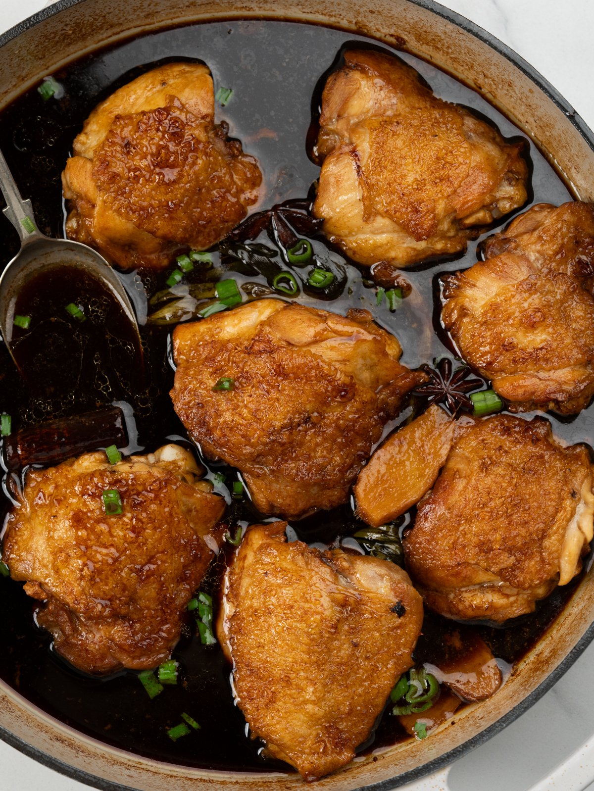 Succulent chicken thighs slow cooked with soy sauces, spices and aromatics.