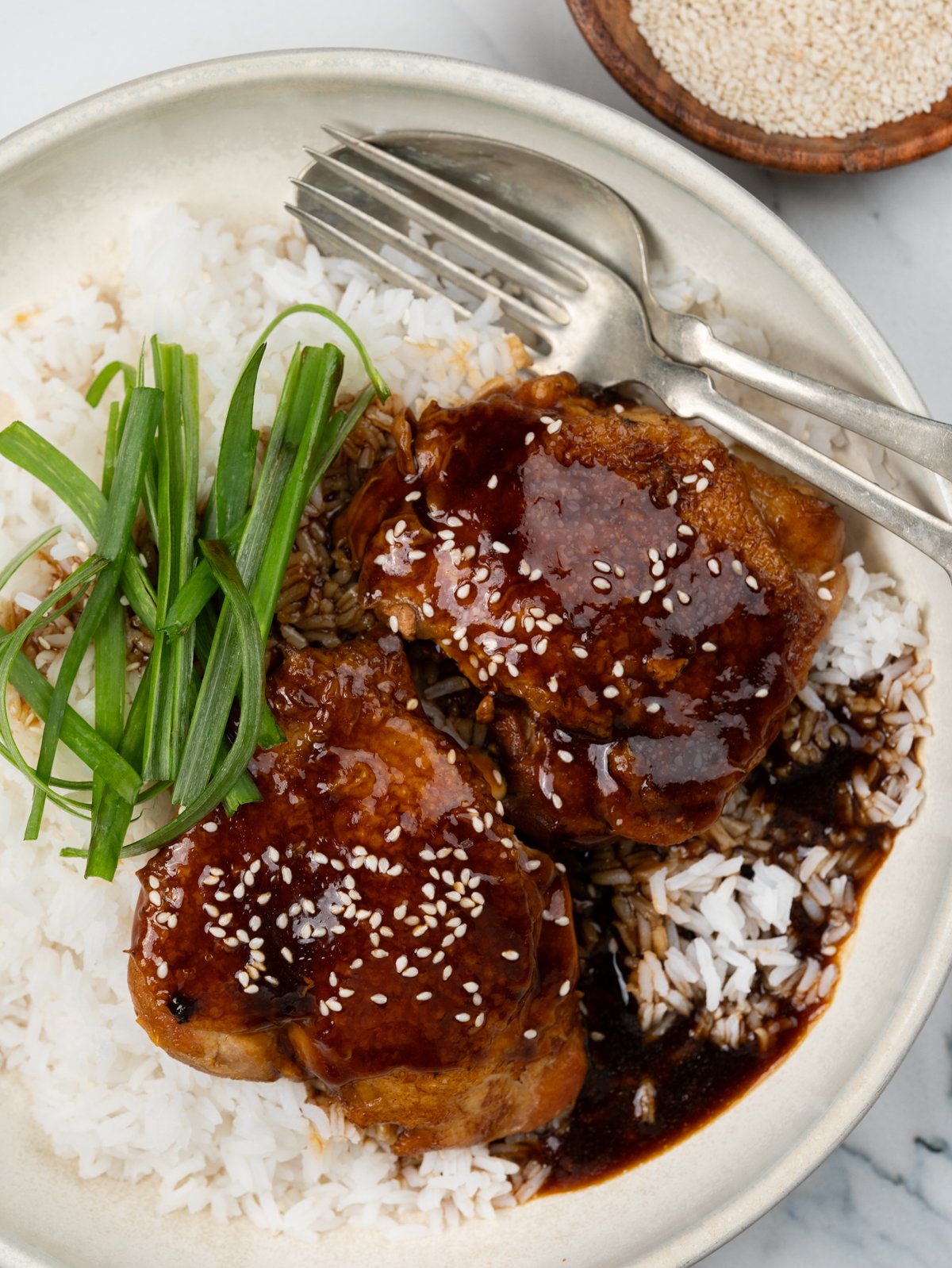 Serve soy sauce chicken over a bed of white jasmine rice.