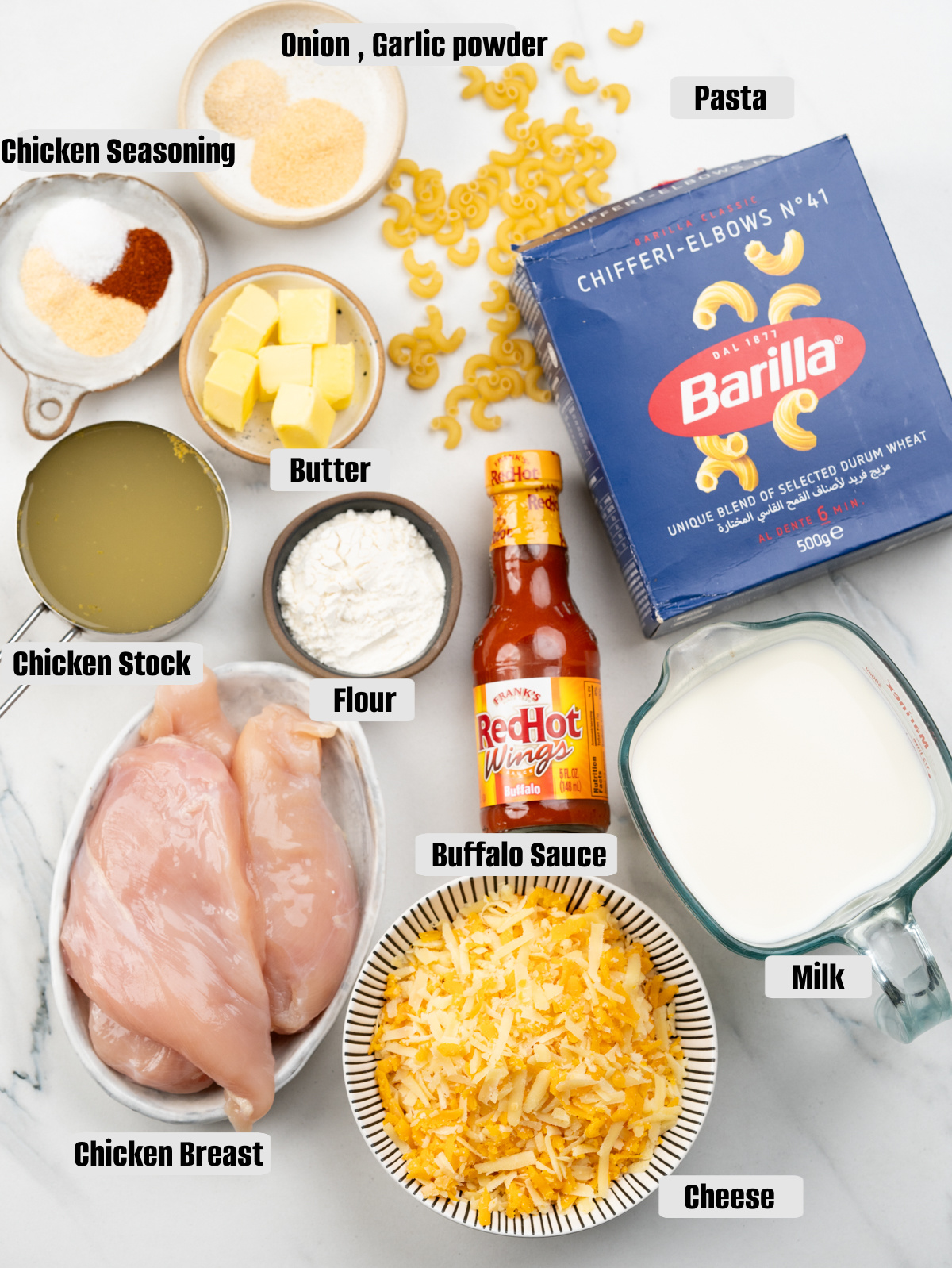 Ingredients - Macaroni pasta, Red hot buffalo sauce, Butter, flour and milk, Chicken breast, Chicken stock,  garlic and onion powder.