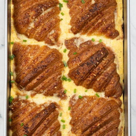 A croissant breakfast casserole brings together flaky crispy croissant and a casserole where the egg, milk, and cream bake into a custard like consistency. Easy to assemble and bake, this can also be prepped overnight.