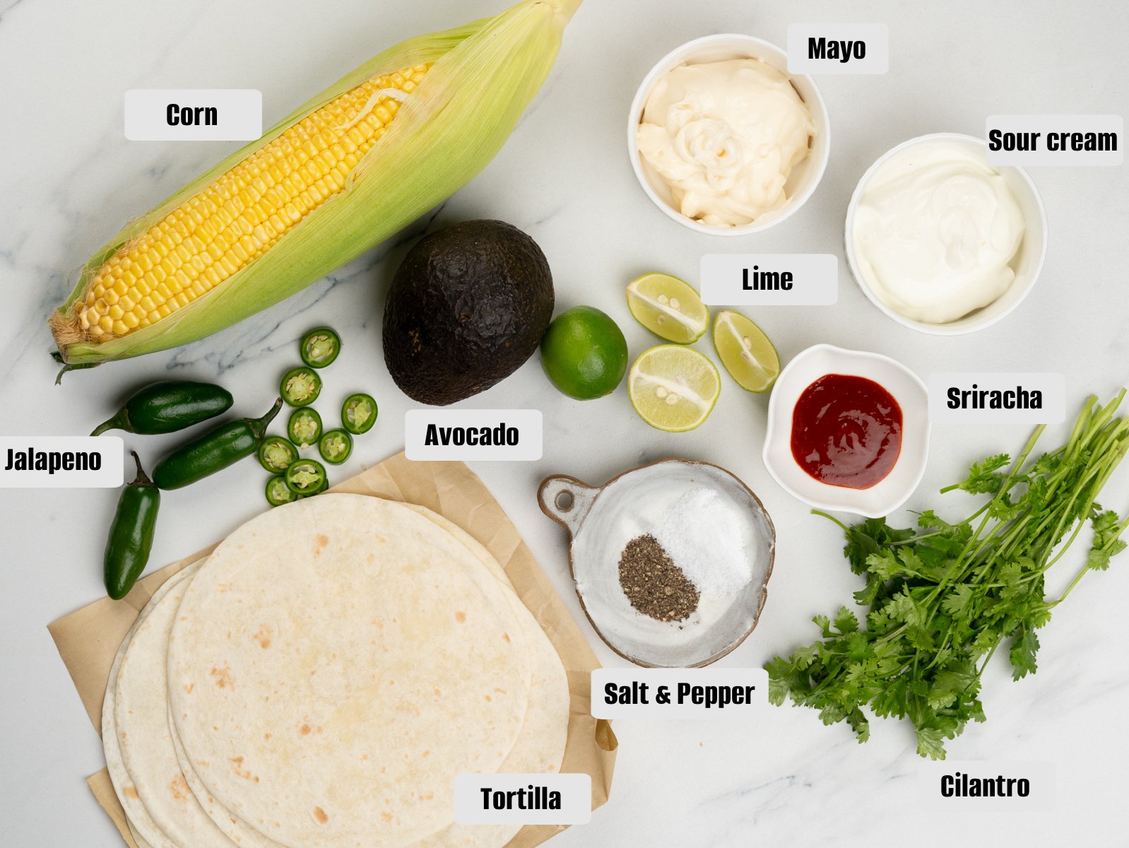 Ingredients for the sauce - Mayo, sour cream, sriracha and lime.
Ingredients for salsa - Corn on the cob, avocado, jalapenos, lime, seasonings and cilantro.