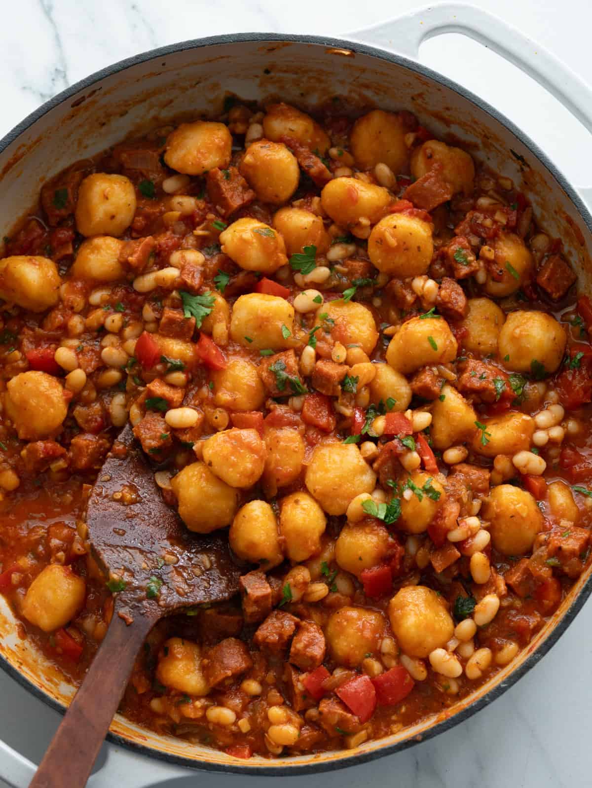 Chorizo gnocchi with white bean in a tangy tomato sauce