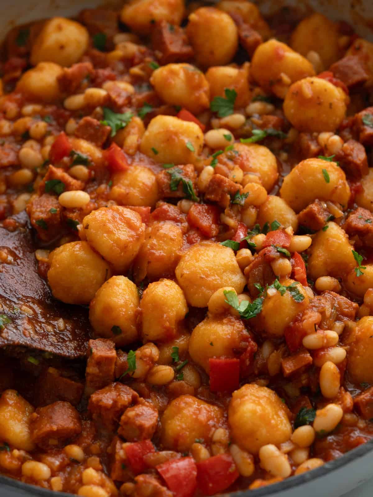 Chorizo gnocchi with white bean in a tangy tomato sauce